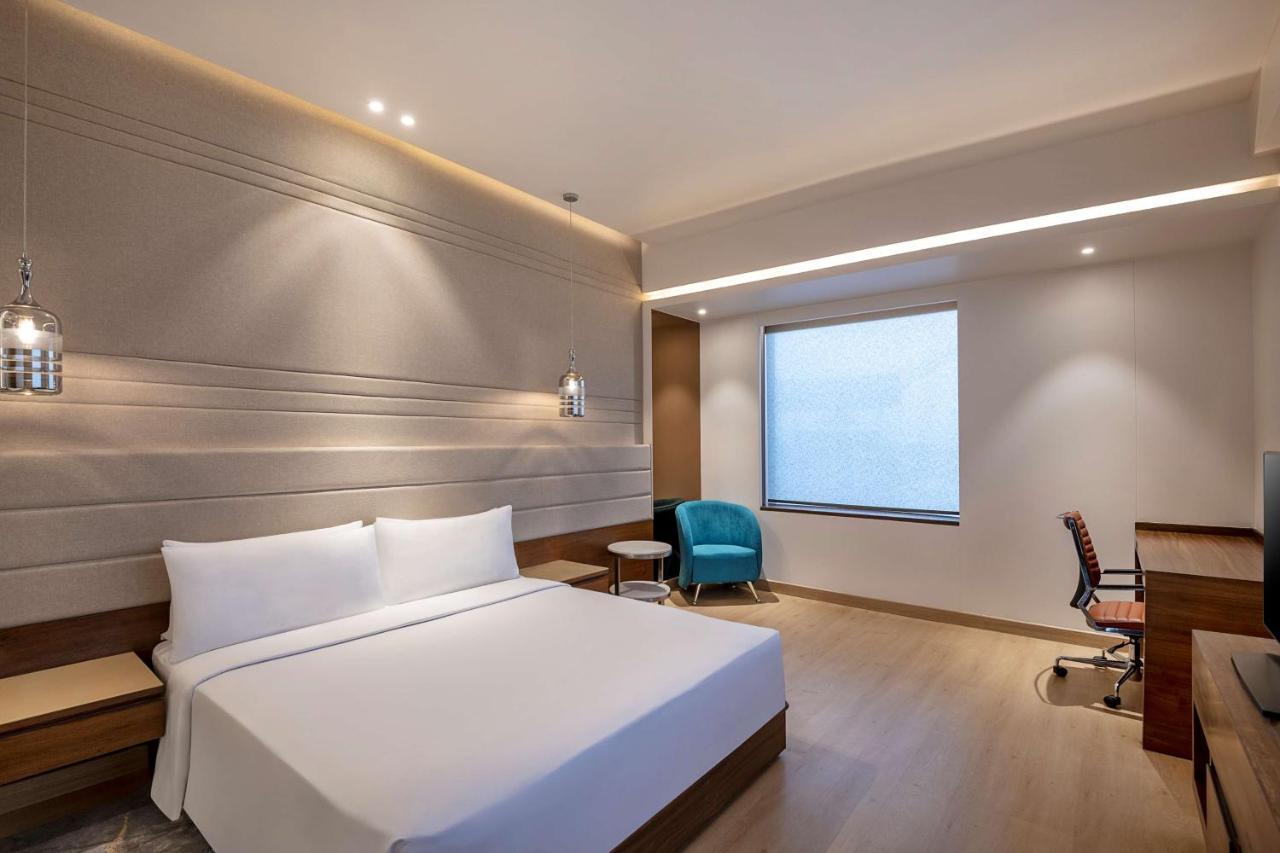 מלון גאזיאבאד Radisson Blu Towers Kaushambi Delhi Ncr מראה חיצוני תמונה A room at the hotel