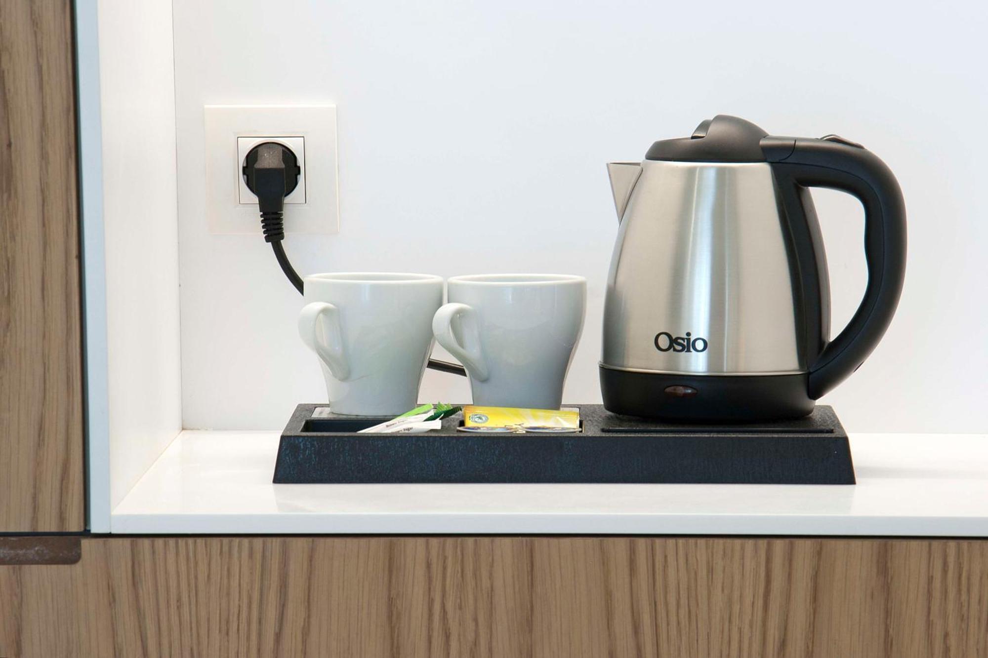 מלון גאזיאבאד Radisson Blu Towers Kaushambi Delhi Ncr מראה חיצוני תמונה A kettle