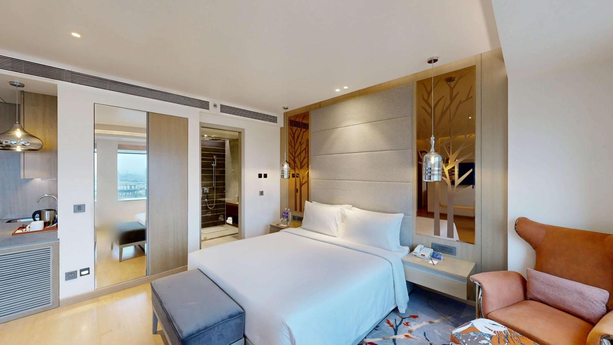 מלון גאזיאבאד Radisson Blu Towers Kaushambi Delhi Ncr מראה חיצוני תמונה A bedroom at the hotel